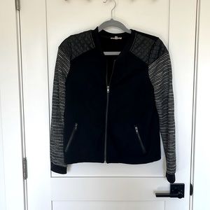 Black quilted shoulder jacket